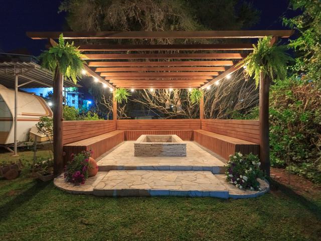 Pergola and garden lighting in use after dark